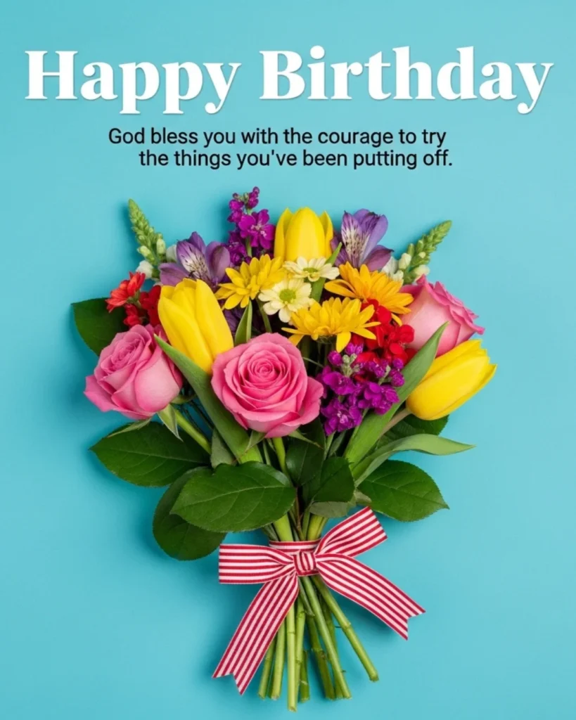 God bless you on your birthday wishes image with a colorful mixed flower bouquet of roses, tulips, and daisies tied with red striped ribbon on bright teal blue background