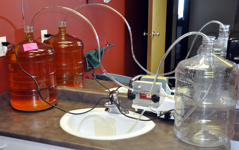 What Equipment Is Used to Clarify and Filter Fruit Wine?